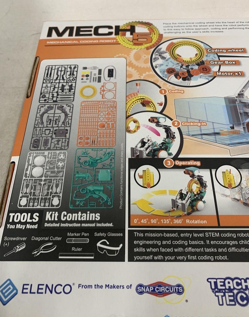 Puede incluir: Una caja colorida para un kit de robot de codificaci&oacute;n mec&aacute;nica. La caja muestra un robot verde con una rueda de codificaci&oacute;n, una caja de engranajes y un motor. La caja tambi&eacute;n incluye una lista de herramientas necesarias para el kit, como un destornillador, un cortador diagonal, un bol&iacute;grafo marcador y gafas de seguridad. La caja presenta el texto "MECH 5" y "ELENCO From the Makers of SNAP CIRCUITS TEACH TEC".