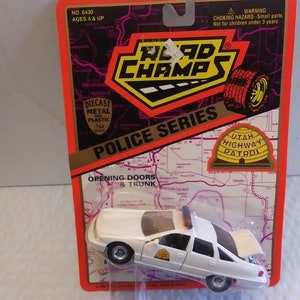 Vintage Utah Highway Patrol police squad car die-cast vehicle, 1/43rd scale, IOP