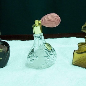 3 glass perfume bottles - An Art Nouvea frosted floral bottle, embossed design