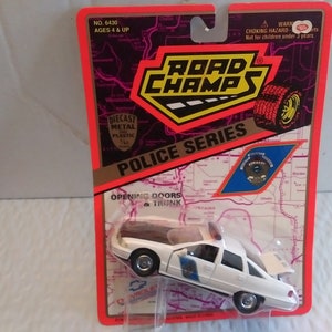 Vintage Alaska State Troopers squad car die-cast vehicle, 1/43rd scale, IOP