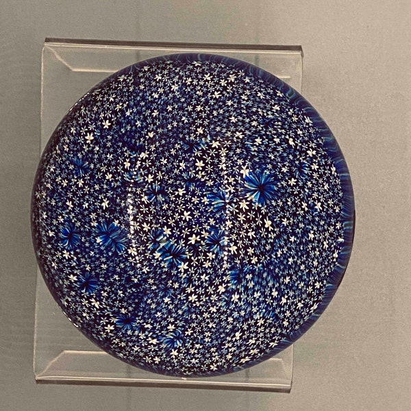 Millefiori Blue Canes paperweight. Closely packed canes. Reminiscent of a field of stars. 4 in wide x 3 in high. Approx late 1980s. Italian