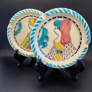Handcrafted in Orvieto, Italy. Vintage 80s handpainted set of 2 round, edged dishes. Price is for the set.