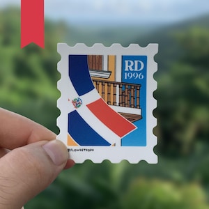 May include: A white sticker with a blue, red, and white Dominican Republic flag, a building with a balcony, and the text "RD 1996".