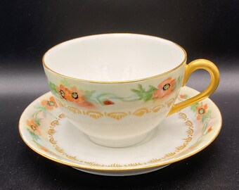 Jean Pouyat (J.P.L) teacup and saucer, white porcelain, hand painted with poppies, gold details, rims and handle.  ANT 1890-1902 France