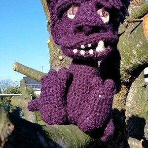 Crochet toy. Halloween. Violet demon. Devil. Crochet figurine. Wool toy. Amigurumi handmade toy. A soft toy. Good gift ideas.