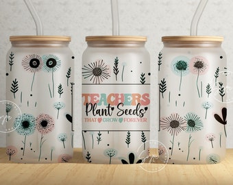 May include: Three frosted glass canisters with bamboo lids and straws. Each canister has a different design. One canister has a floral design with the text "Teachers Plant Seeds That Grow Forever".