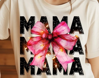 May include: A white t-shirt with the word "MAMA" repeated three times in black with a pink bow and white lights in between each word.
