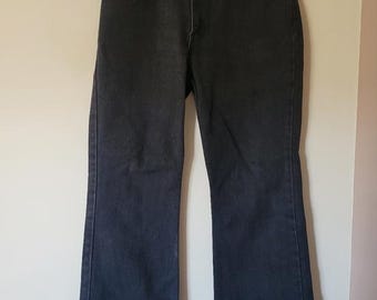 Jeans Levi's de mezclilla negra de tiro alto y corte bota holgado para mujer, estilo vintage Y2K, talla 28.
