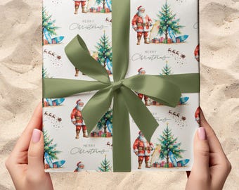 May include: A wrapped gift with a festive Christmas-themed wrapping paper featuring Santa Claus, Christmas trees, surfboards, and the words "Merry Christmas." The gift is tied with a green ribbon and bow.