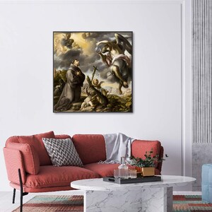 May include: A painting depicting a religious scene with a man kneeling in prayer, surrounded by angels. The scene is set in a landscape with a cloudy sky. The painting is framed in a black frame.