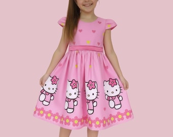 Vestido de lujo de Hello Kitty con fondo rosa.
