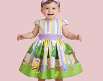 Luxe BichiKids jurk met lila ceintuur.