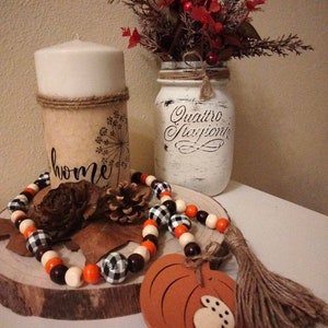 Guirlande décorative de perles de bois