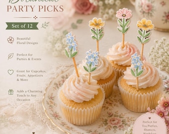 May include: A set of twelve botanical party picks featuring illustrated flowers in yellow, pink, and blue on wooden sticks. The picks are inserted into cupcakes with light pink frosting, arranged on a floral patterned plate with text.