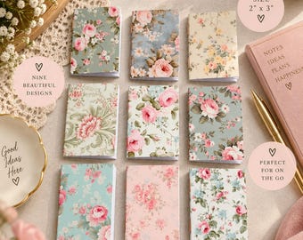 May include: Nine mini notebooks arranged in a grid, each featuring a unique floral pattern with roses in shades of pink, blue, green, and cream. Each notebook measures 2 inches by 3 inches. The text reads Mini Notebooks, Small Notes, Big Ideas.