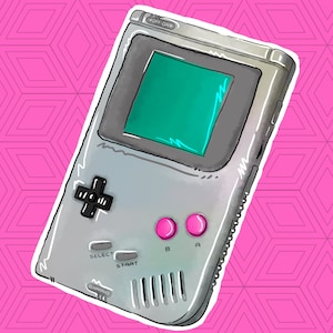 May include: A gray and white handheld video game console with a teal screen. The console has a pink button labeled "A" and a pink button labeled "B". The console also has a black button labeled "SELECT" and a black button labeled "START".