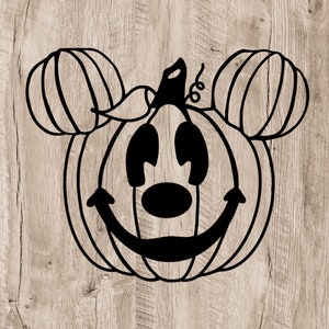 May include: Black and white silhouette of a pumpkin with Mickey Mouse ears and a smiling face.