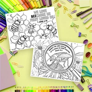 May include: Two coloring pages with black and white illustrations. One features bees and honeycomb with the text "WE LOVE BEECAUSE HE FIRST LOVED US 1 JOHN 4:19". The other shows a bug under a magnifying glass with the text "MAGNIFY THE LORD WITH ME. LET US PRAISE HIS NAME TOGETHER PSALM 34:3".