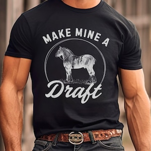 May include: A black t-shirt with a white graphic of a draft horse and the text "Make Mine a Draft".