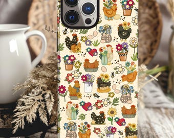 May include: A phone case with a whimsical chicken and floral design. The case features various chickens, flowers, eggs, and bees on a cream-colored background. The text "Shown on iPhone 16" is visible on the bottom left.