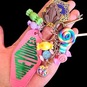 Honeydukes vintage hotel style keychain. *See item description Honeydukes keychain