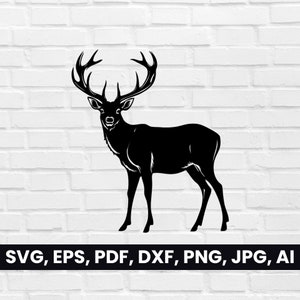 May include: A black silhouette of a deer with large antlers. The deer is standing on a white brick background.