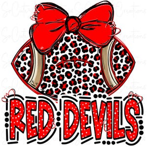 May include: Red and black football with a red bow on top. The football is covered in a leopard print pattern. The words "RED DEVILS" are written in red with white polka dots.