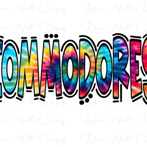 May include: A colorful tie-dye design spelling out the word "COMMODORES" in a bold, black outline.