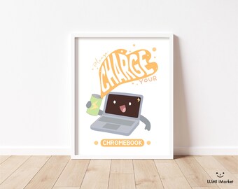 May include: A framed print featuring a cartoon laptop character holding a green can with a lightning bolt. The text "Please Charge Your Chromebook" is in orange. The print is on a white background.