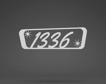 May include: A silver metal house number sign with the number 1336 in a retro font. The sign is rectangular with rounded corners and starburst designs on each end. The sign is set against a gray background.