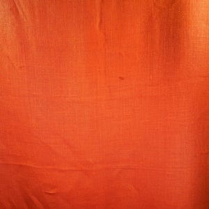 Schumacher orange linen fabric remnant