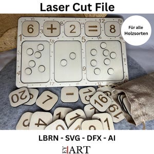 May include: Wooden math learning toy with numbers and symbols. The set includes a wooden board with cutouts for numbers and symbols, plus individual number tiles. The text "Laser Cut File" is at the top.