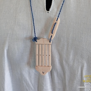 Mini handmade Maple rigid heddle warp with space for 9 strands