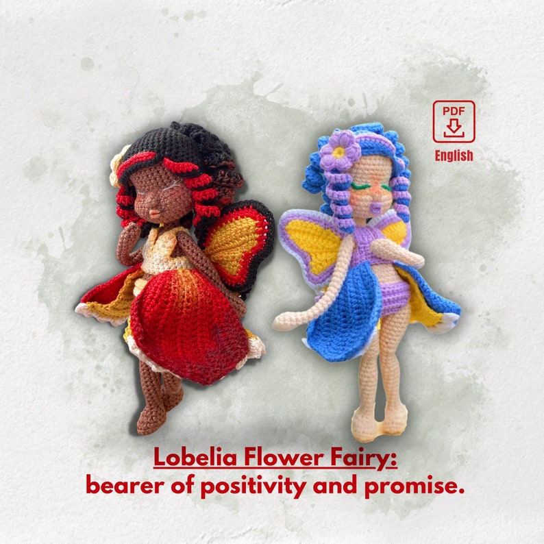 May include: Two crocheted flower fairies, one with red and yellow wings and the other with blue and yellow wings. The text "Lobelia Flower Fairy: bearer of positivity and promise." is at the bottom of the image.