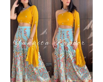 Haldi yellow stylish one shoulder blouse with sky blue heavy embroidered palazzo set crop top for haldi function yellow party wear dress