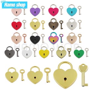 May include: Assortment of 16 heart-shaped padlocks with keys in various colours, including gold, silver, black, red, blue, green, purple, and rainbow. The padlocks are all the same size and shape, and the keys are all the same size.