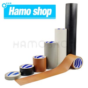 Op de afbeelding: Assortiment van rollen tape in verschillende kleuren en breedtes, waaronder zwart, bruin, wit en grijs. De tape is gelabeld met "Hamo shop".