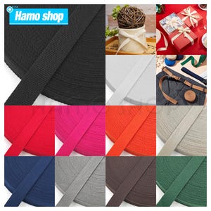 May include: A variety of colors of woven cotton webbing, each color is rolled up in a circle. The colors are black, white, red, pink, orange, beige, navy blue, gray, brown, and green. The text "Hamo shop" is in the top left corner of the image.