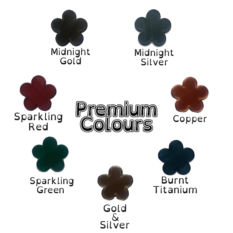K&ouml;nnte beinhalten: Eine Sammlung von sieben blumenf&ouml;rmigen Objekten mit der Aufschrift Premium Colours, die in Midnight Gold, Midnight Silver, Sparkling Red, Copper, Sparkling Green, Burnt Titanium und Gold & Silver gehalten sind und kreisf&ouml;rmig auf wei&szlig;em Grund angeordnet sind.