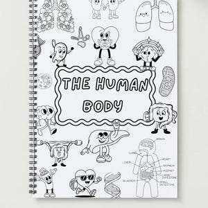 May include: A spiral-bound notebook with a black and white illustration of the human body. The cover features the text "THE HUMAN BODY" and various cartoon drawings of organs, including lungs, a heart, and a brain.