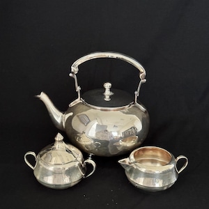 Vintage Three footed Silver Plate Tea Pot with cream and sugar