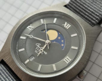 Vintage Osco Titan maanfase quartzhorloge, Duits minimalistisch dresswatch, NOS 1990