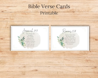 May include: Two printable Bible verse cards with watercolor backgrounds and floral accents. The first card features Jeremiah 29:11, "For I know the thoughts that I think toward you, saith the Lord, thoughts of peace, and not of evil, to give you an expected end." The second card features Romans 8:28, "And we know that all things work together for good to them that love God, to them who are the called according to his purpose."