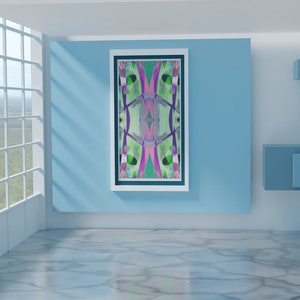 May include: A framed abstract painting with a colorful geometric design in shades of pink, green, and purple hangs on a light blue wall in a modern room with a large window and white walls.
