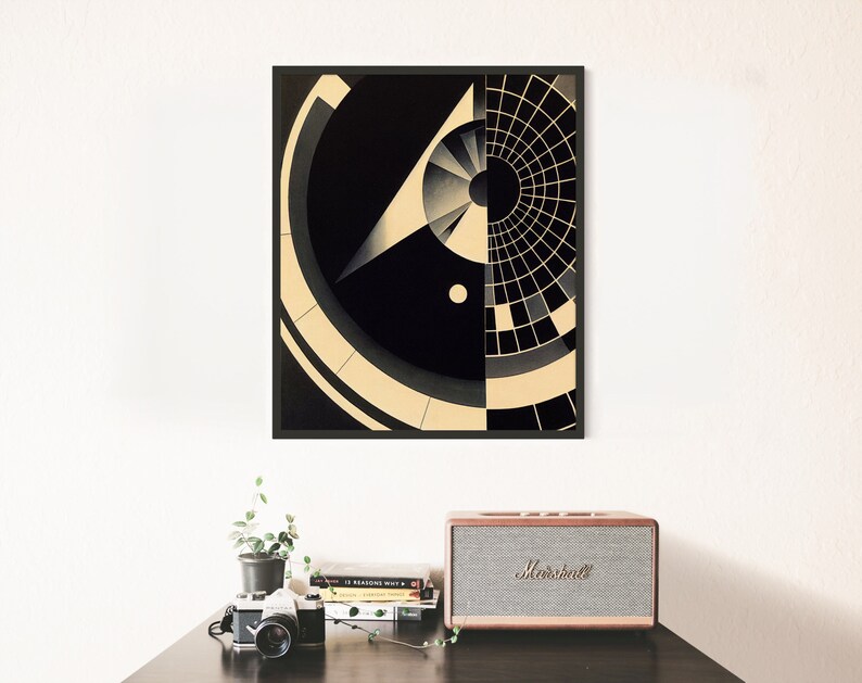 Puede incluir: Impresi&oacute;n de arte geom&eacute;trico abstracto con formas negras y blancas y un dise&ntilde;o circular. La impresi&oacute;n est&aacute; enmarcada en un marco negro.