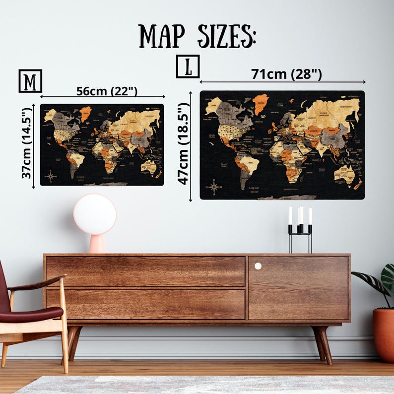 May include: Two rectangular world maps labeled M and L with black backgrounds and continents in shades of wood, orange, and gray. Size M is 56cm by 37cm (22 by 14.5 inches) and size L is 71cm by 47cm (28 by 18.5 inches). Text reads MAP SIZES.