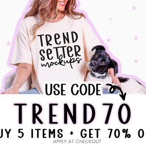 A woman wearing a white t-shirt with the text "TEND SETTER mockups" is holding a dog, and there is a pink starry background. The image is promoting a sale, offering a 70% discount on items purchased at checkout.