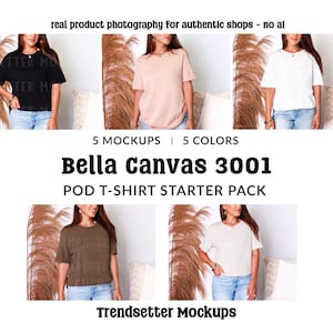 May include: An image showcasing five Bella Canvas 3001 t-shirt mockups in various colors: black, peach, white, olive green, and cream. The text "5 MOCKUPS | 5 COLORS" and "Bella Canvas 3001 POD T-SHIRT STARTER PACK" are displayed. The phrase "real product photography for authentic shops - no ai" is also visible.