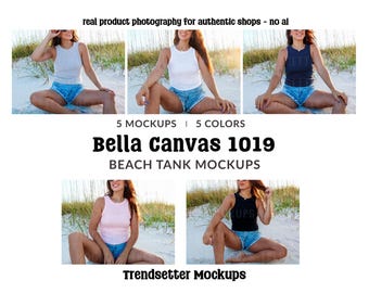 May include: Five mockups of Bella Canvas 1019 beach tank tops in various colors. The image shows women wearing the tank tops in white, light blue, navy, pink, and black. Text on the image reads "real product photography for authentic shops - no ai".