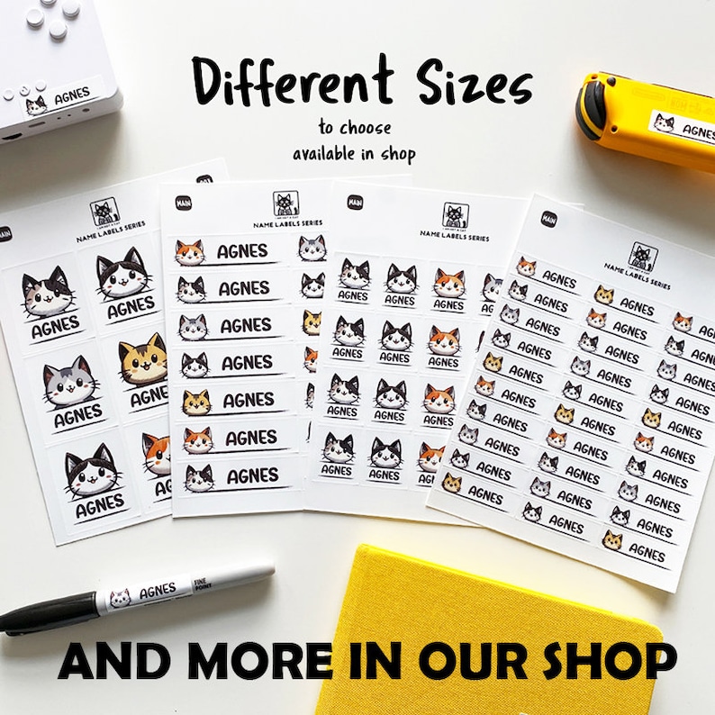May include: Sheets of personalized name labels featuring cat illustrations and the name "Agnes." The labels come in various sizes and cat designs, with text that reads "Different Sizes to choose available in shop" and "And more in our shop."